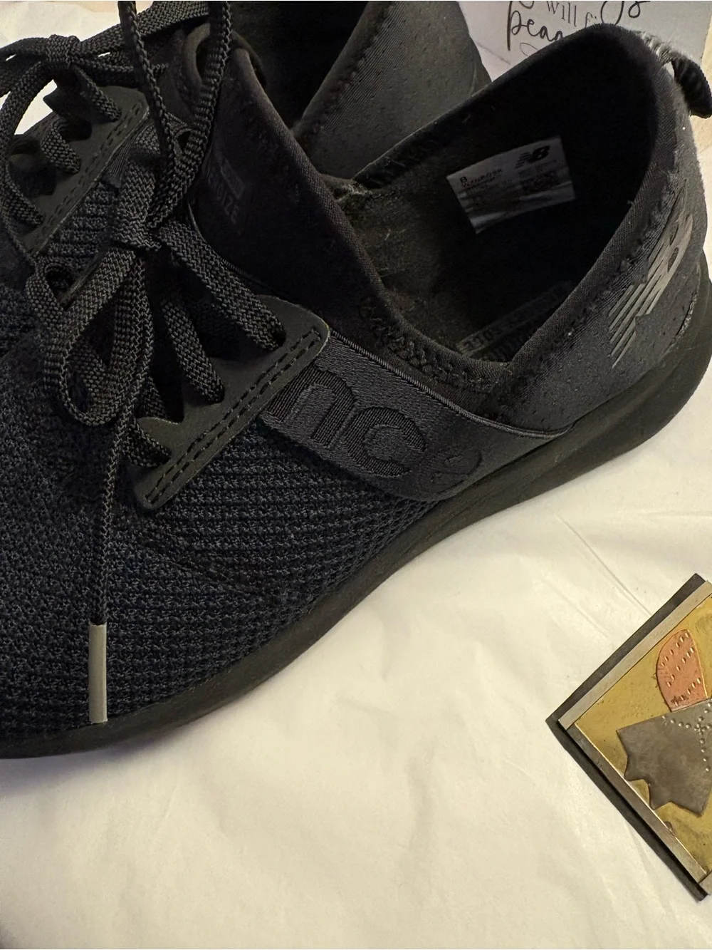 New Balance Woman’s Black Slip-On Knit Sneakers